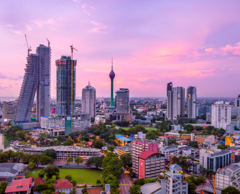 Colombo Sri Lanka skyline cityscape photo. Sunset in Colombo with views over the biggest city in Sri Lanka island. Urban views of buildings and the Laccadive Sea